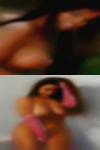 Tanned women n tattooed.